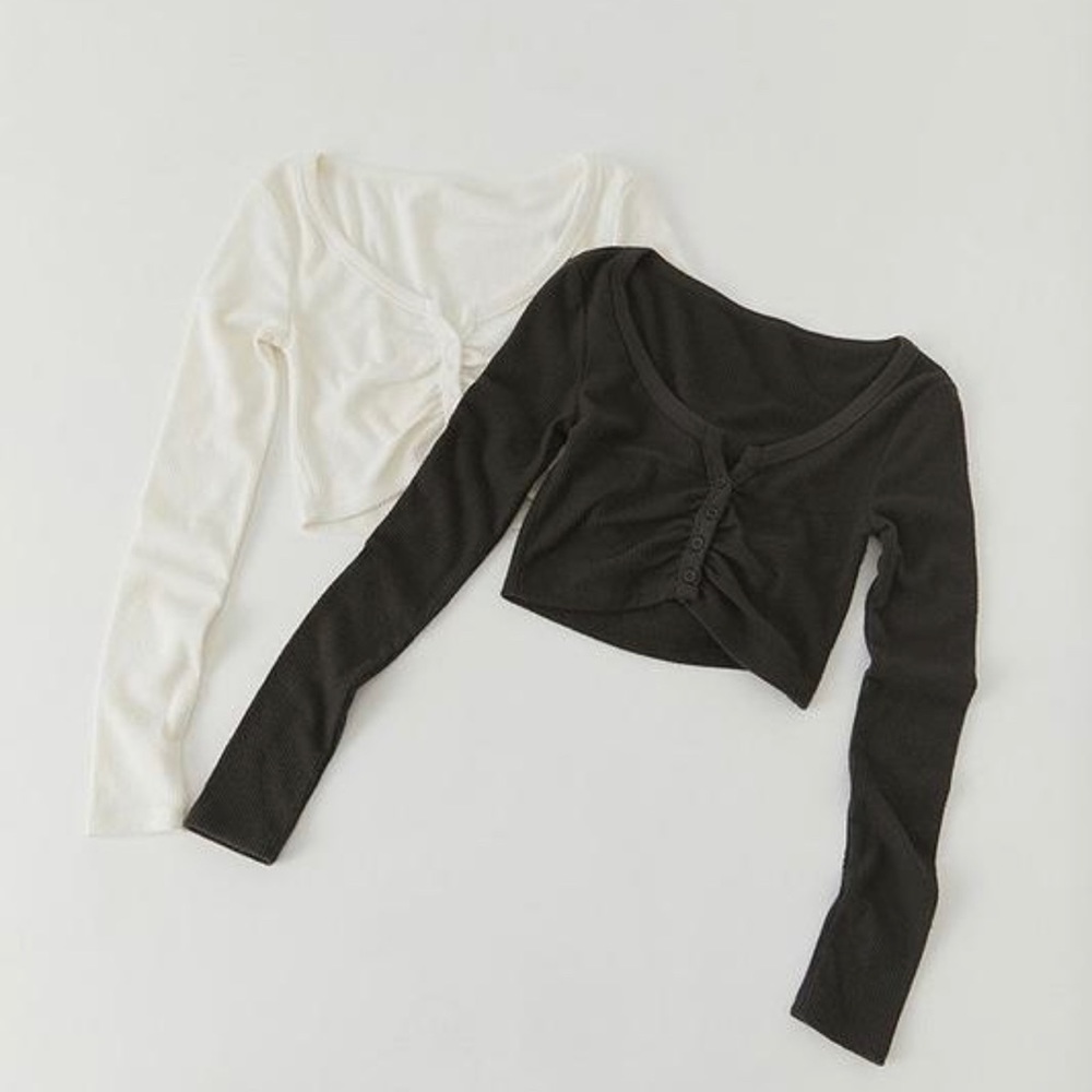 Black long sleeve button up top.